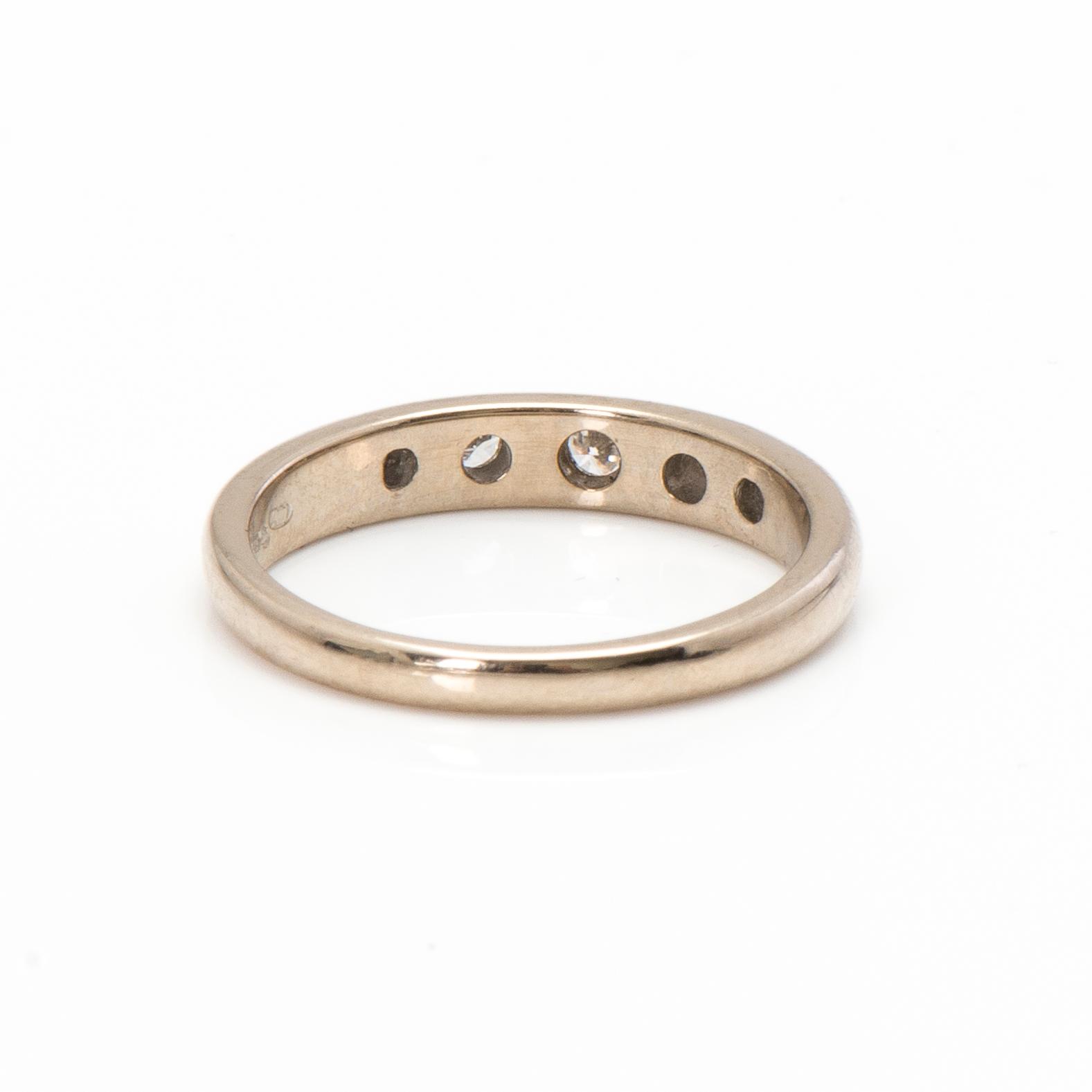 A 14K white gold ring with diamonds ca. 0.15 ct in total. Estetika Oy, Helsinki 2000.