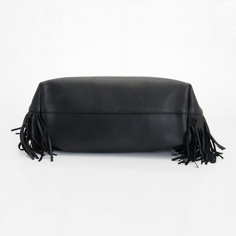 Saint Laurent, a 'Sac shopping' bag.