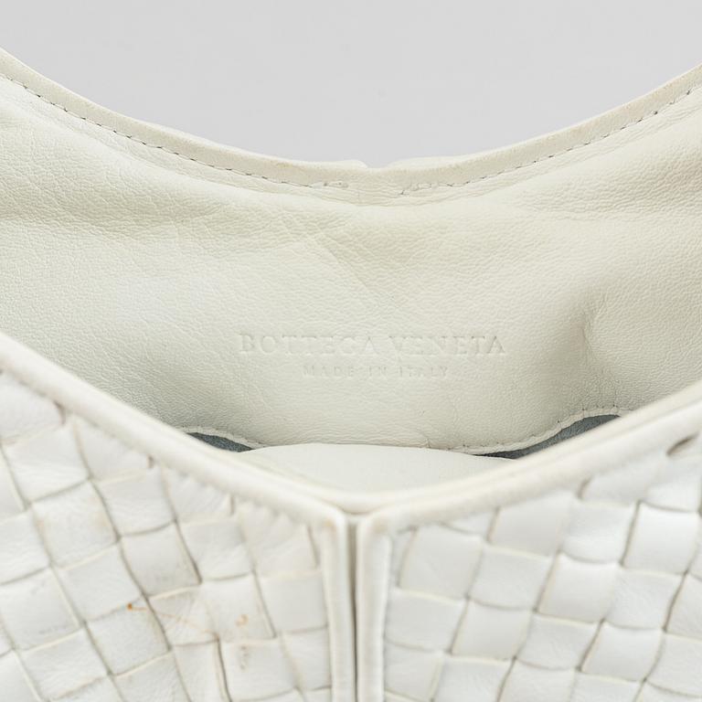 Bottega Veneta, a white intrecciato leather hobo bag.