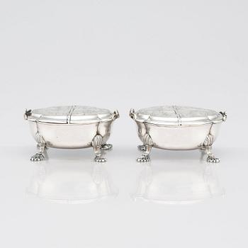 A pair of Latvian Rococo silver salt and pepper stands, marks of Johan Christian Henck (Henke), Riga 1768-80.