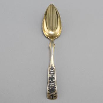 A Russian 19th century silver-gilt and niello spoon, unidentified makers mark, Moscow 1835.