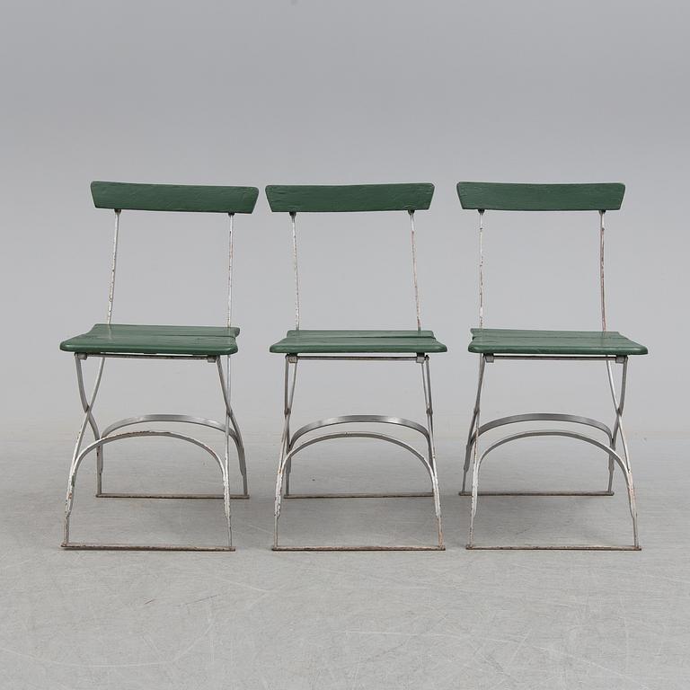 A garden table and four chairs, first half of the 20th century.