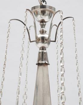 An Elis Bergh silver plated Swedish Grace chandelier, C.G. Hallberg, Stockholm.