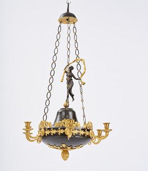 A patinated and ormolu six-light Empire chandelier, Stockholm, first part 19th century.