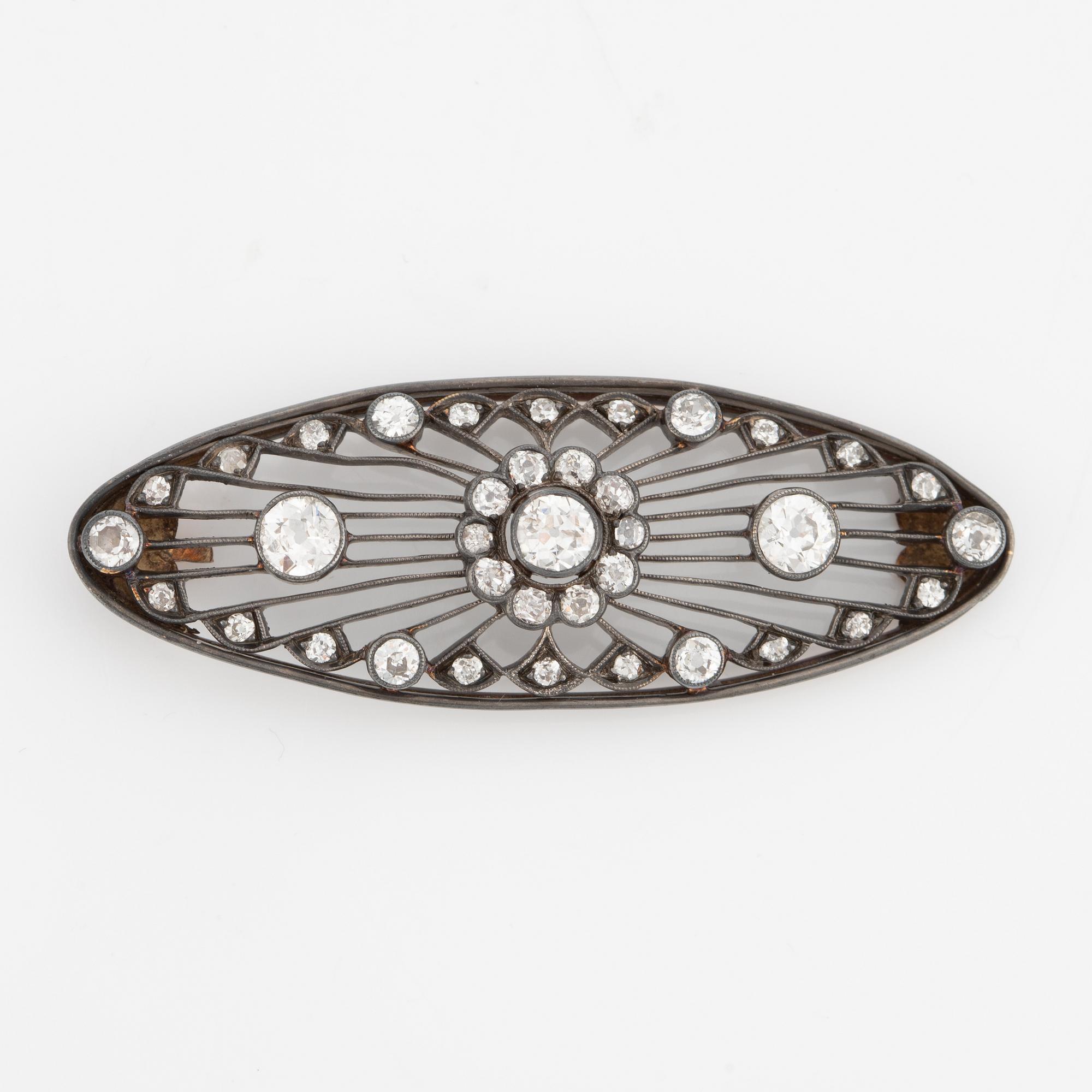 Pendant in silver with old-cut diamonds.