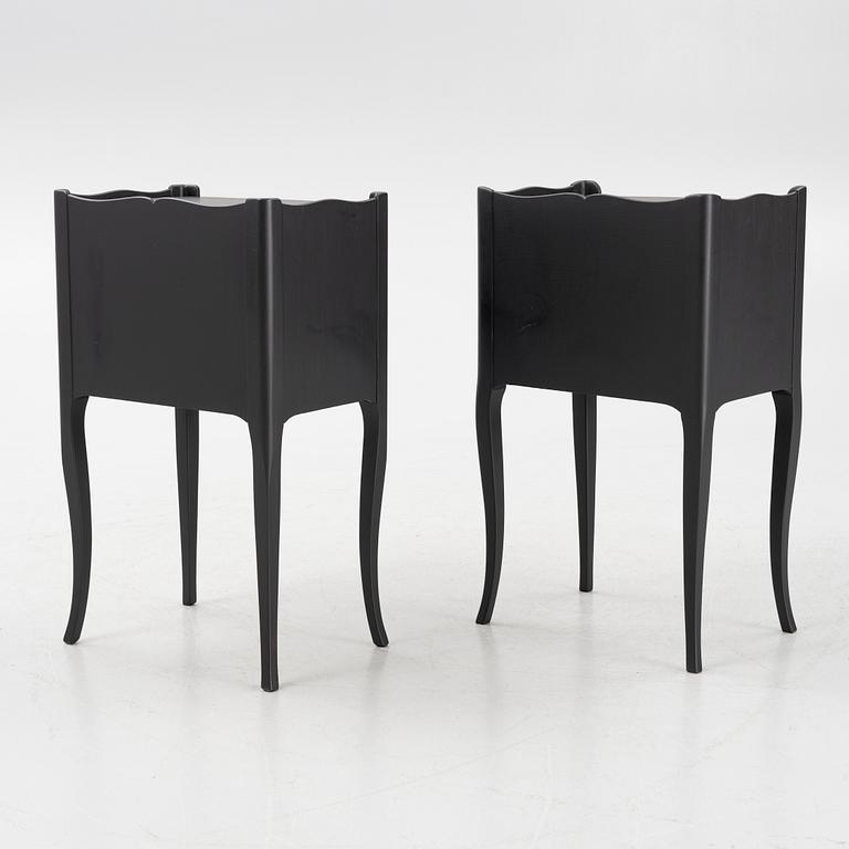 A pair of Rococo style bedside tables, second half of the 20th Century.