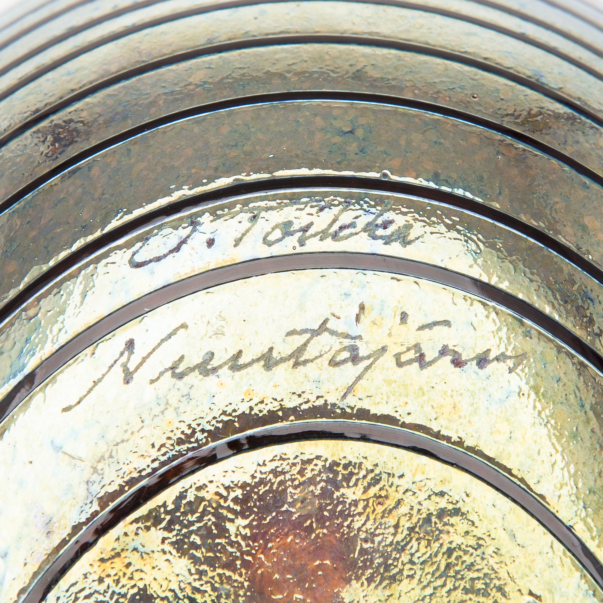 A glass bird, signed O. Toikka Nuutajärvi.