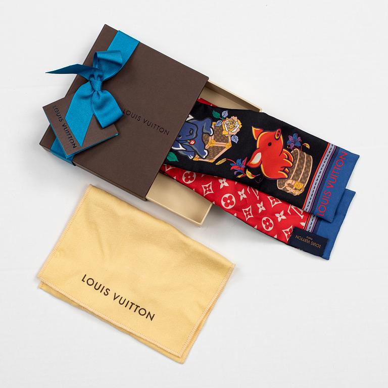 A Louis Vuitton silk monogram 'Superstition' bandeau scarf.