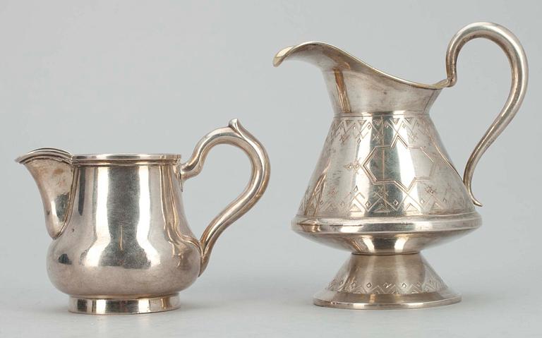 GRÄDDSNÄCKOR, 2 st, silver, Johan Talén Helsingfors 1881. Guldsmed GAS St. Petersburg 1876, Ryssland. Vikt ca 219 gr.