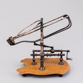 Mechanical Wine Decanting Cradle, around 1900.