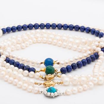 5 necklaces, cultured freshwater pearls approx 7,5-8,5 mm, lapis lazuli beads, 1 clasp 18k gold, 4 silver and metal.