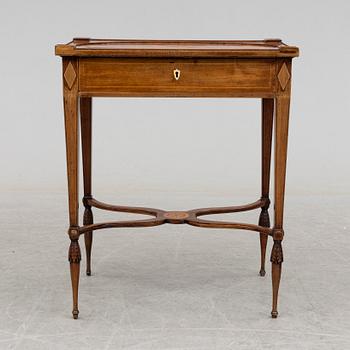 A circa 1800 table in the style of Lars Qvarnberg.