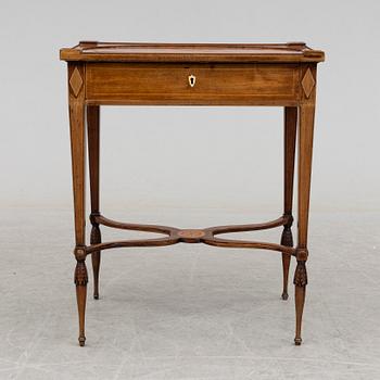 A circa 1800 table in the style of Lars Qvarnberg.