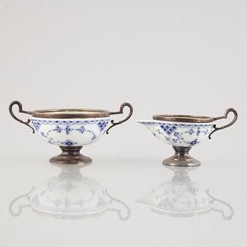 A 'Blue Fluted Half Lace' / 'Musselmalet' sugar bowl and creamer, Royal Copenhagen, around 1900.