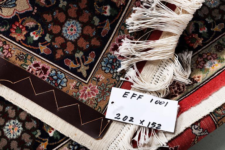 A carpet, Tabriz, part silk, c. 202 x 152 cm.