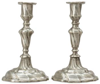 658. A pair of Rococo pewter candlesticks by Johan Anjou (Gävle 1763-1808/10).