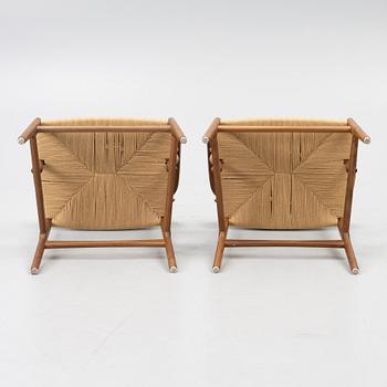 Hans J. Wegner, a pair of CH26 armchairs, Carl Hansen & Son, Denmark, samtida tillverkning.