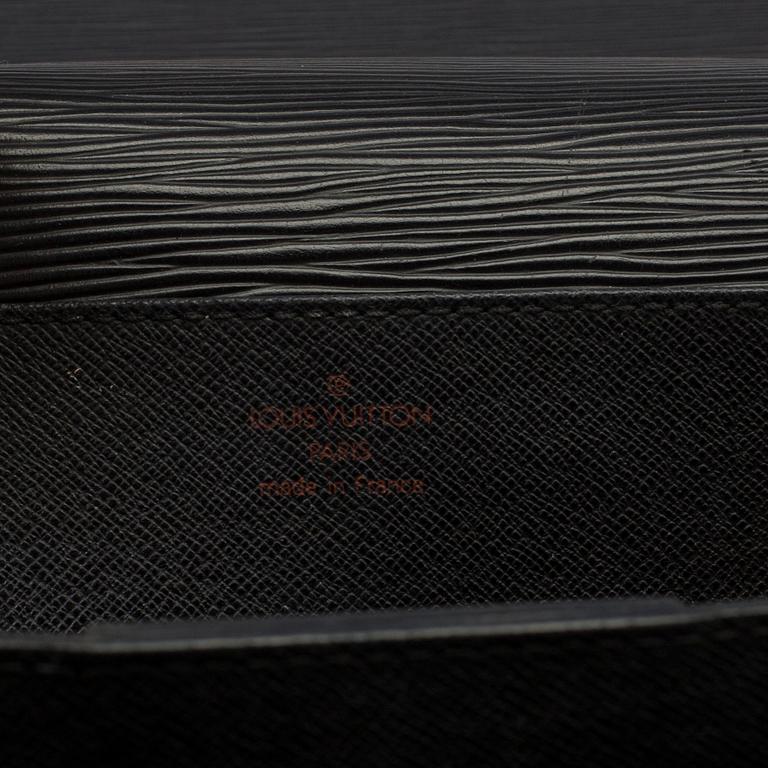 a "Serviette conseiller ambassadeure Epi" bag by LOUIS VUITTON.