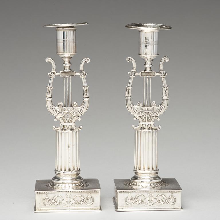 A pair of Swedish 19th century silver cadlesticks, mark of Johan Petter Grönvall, Stockholm 1823.