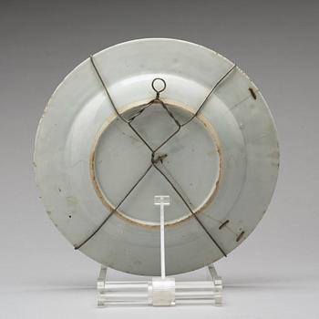A set of four armorial dinner plates, Qing dynasty, Qianlong (1736-95).