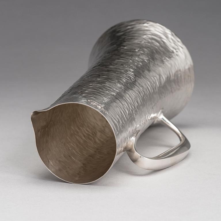 TAPIO WIRKKALA, A silver pitcher with four silver beakers, marked TW, Kultakeskus oy, Hämeenlinna Finland 1973 and 1977.