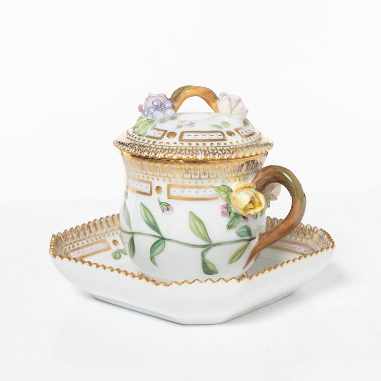 Royal Copenhagen, cream jug with lid and saucer, as well as coffee cup with saucer, porcelain, Flora Danica, Denmark.