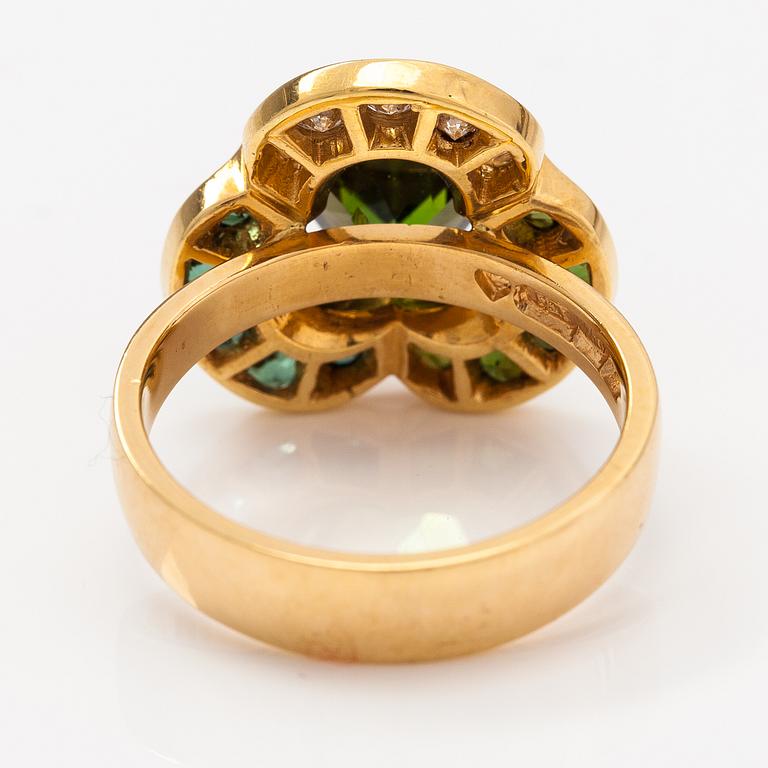 An 18K gold ring "Karin Månsdotter", tourmalines and diamonds ca. 0.26 ct in total. Ofelia Jewelry, Helsinki 1998.