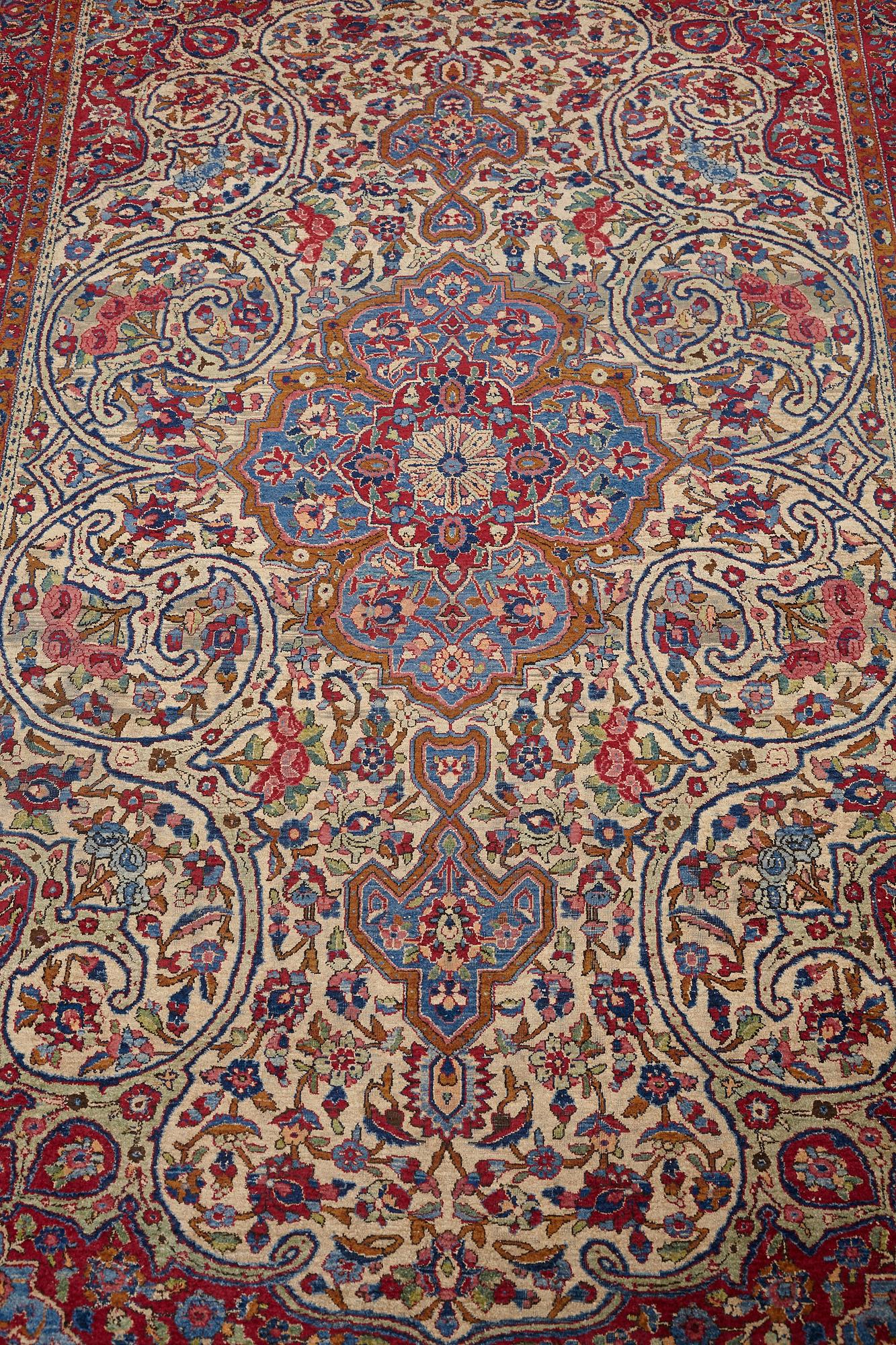 Matto, a semi-antique silk Kashan, ca 212,5-214,5 x 134,5-135,5 cm.