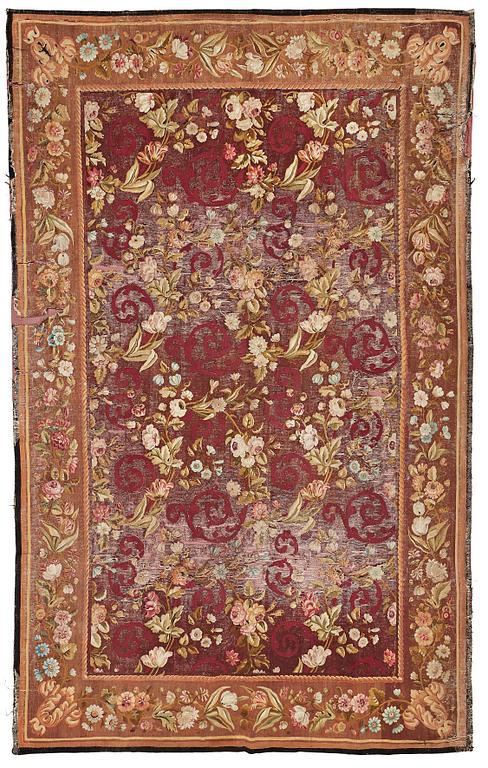 A CARPET, tapestry weave, ca 428 x 266-268,5 cm, Aubusson, France the middle to the end of the 19th century.