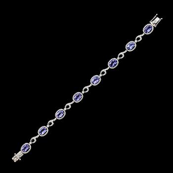 ARMBAND, 18K vitguld, diamanter tot ca 1.65 ct, 8 tanzaniter tot ca 5.70 ct.