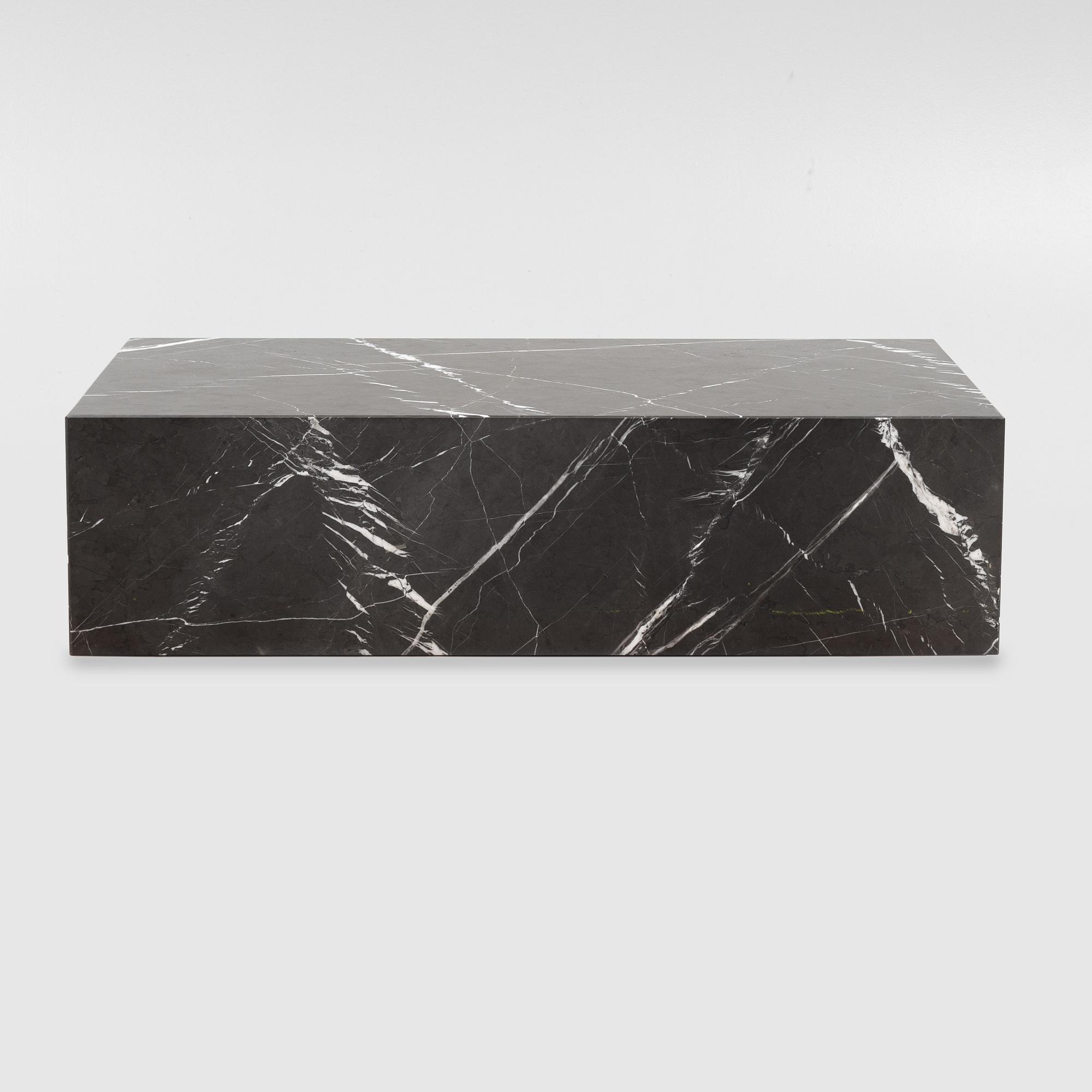 A marble 'Plinth' coffee table from Menu.