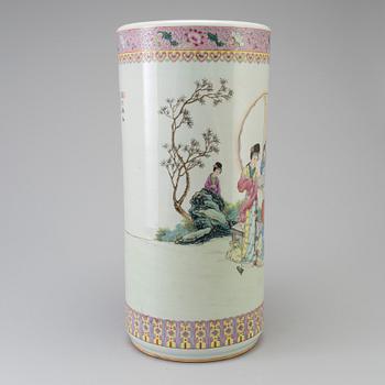 A 20th century porcelain umbrella stand.