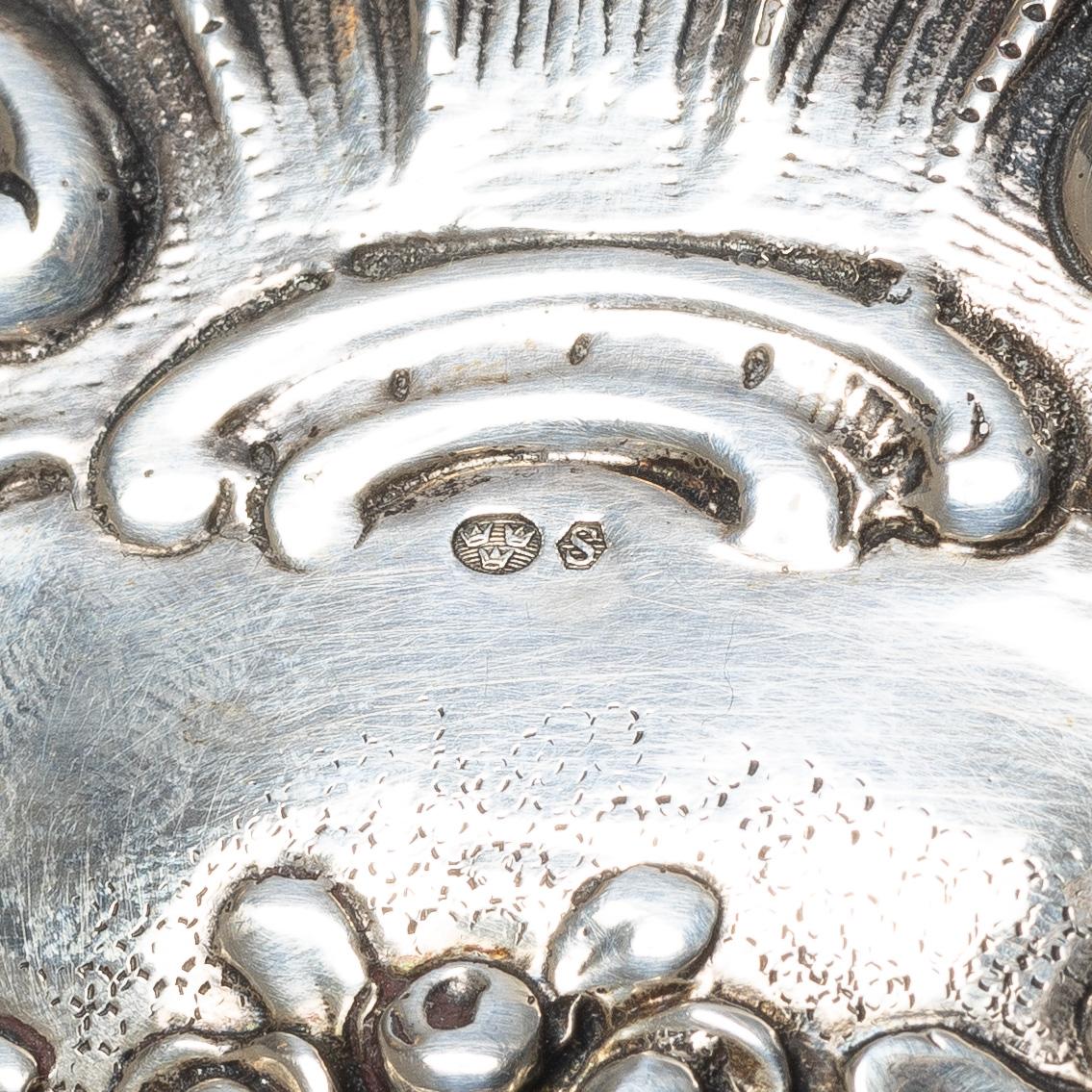 A silver bread basket, Swedish import mark, circa 1900.