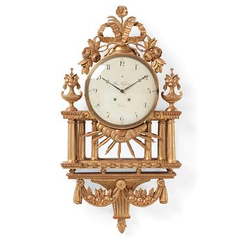 A Gustavian giltwood cartel clock by H. Wessman (watchmaker in Stockholm 1787-1805).