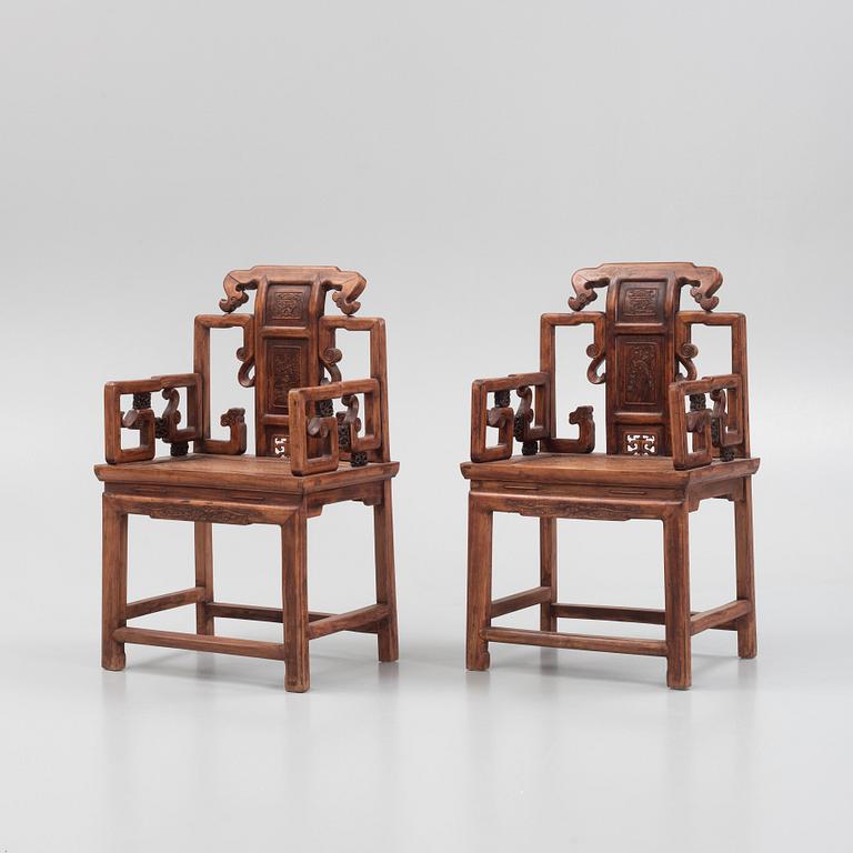 A pair of hardwood chairs, China, early 20th century.