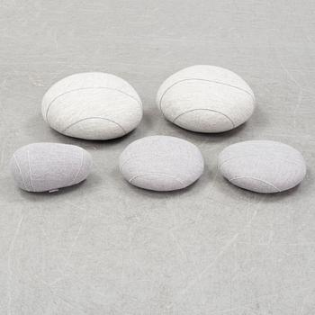 9 pebbles cushions, 'Linvingstones', Smarin, and three stools, 'Wire Log', Pols Potten.