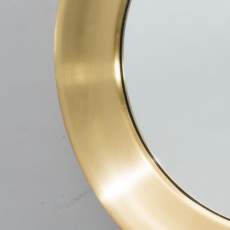 A GLAS MÄSTER WALL MIRROR.