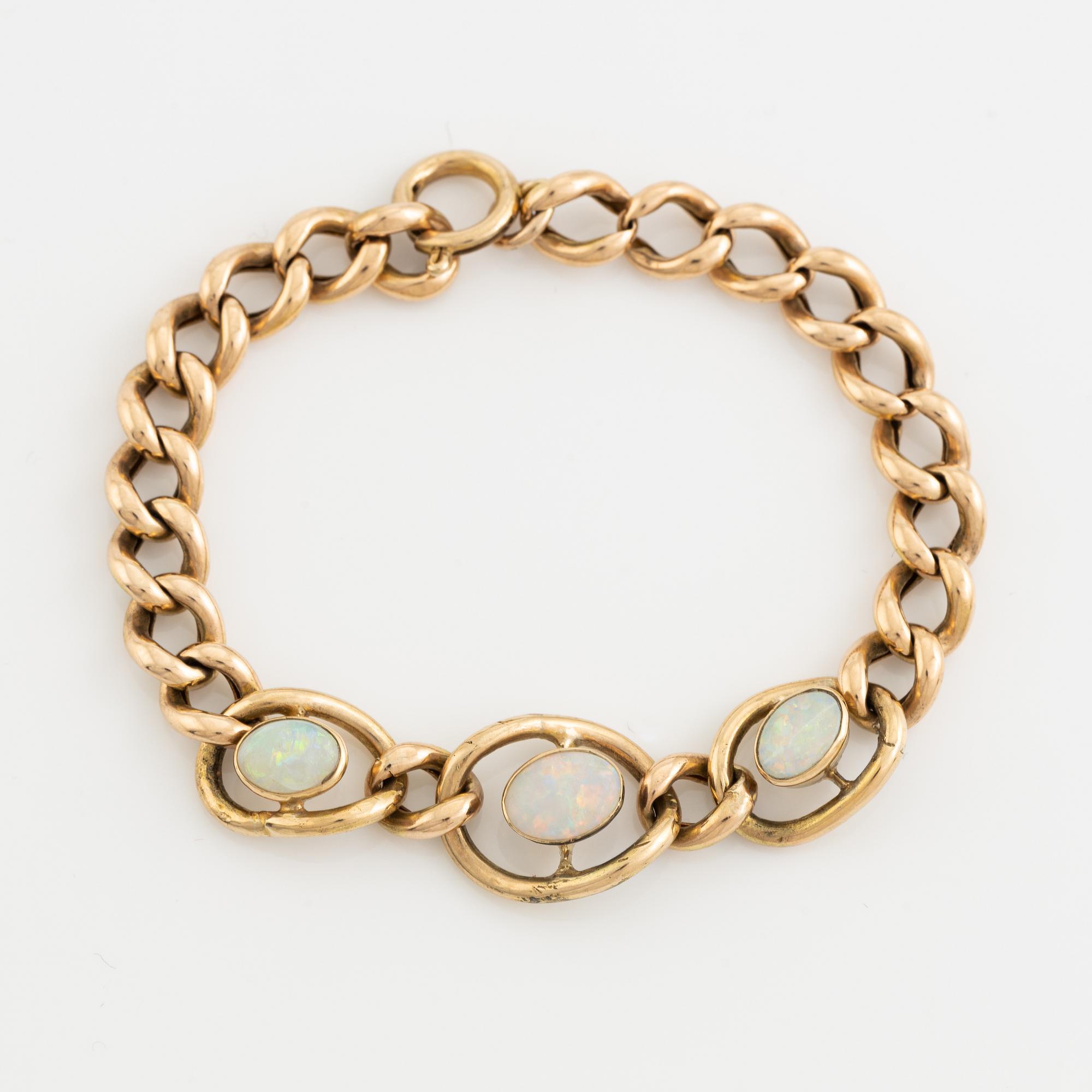 Gold and three opal bracelet.