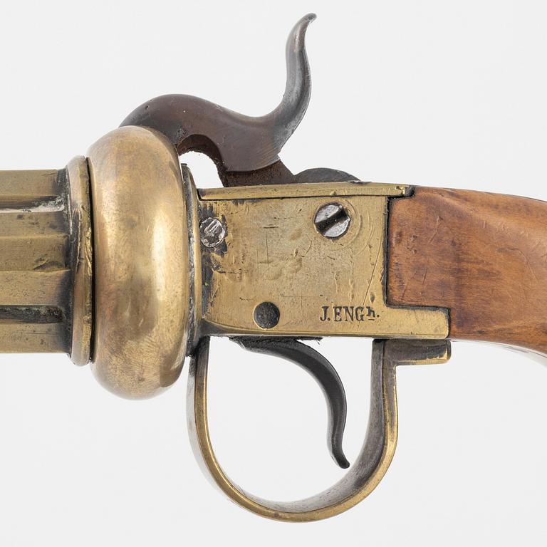 A brass percussion revolver by Johan Engholm (1820-1918).