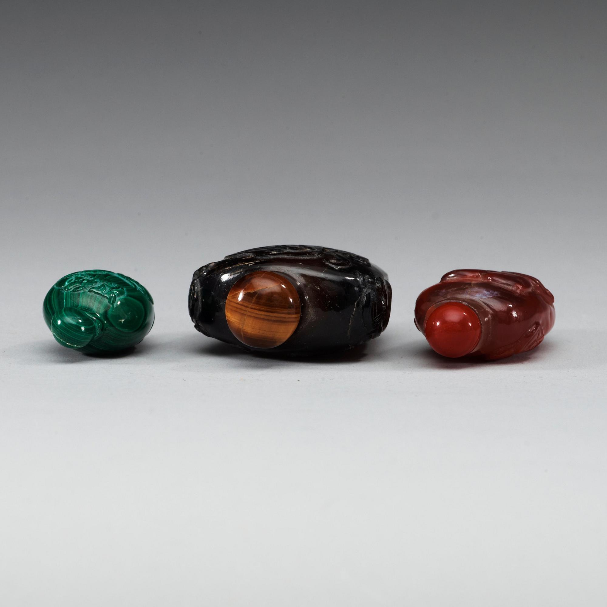 A set of three Chinese snuff bottles.