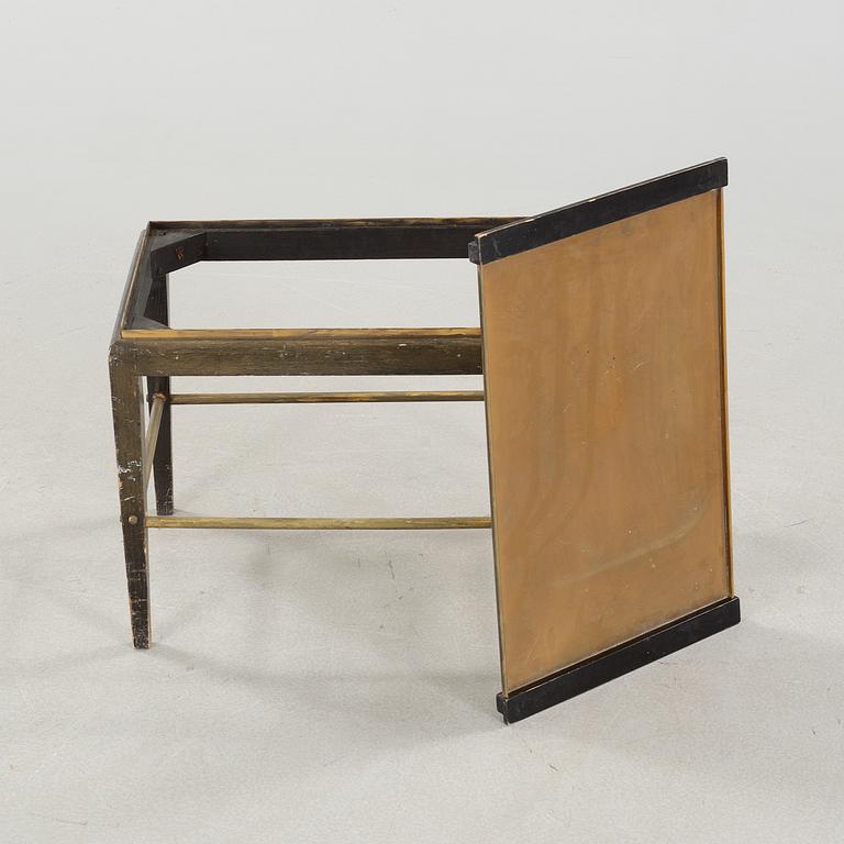 A tray table from the first half of the 20th century by Ystad Brons.