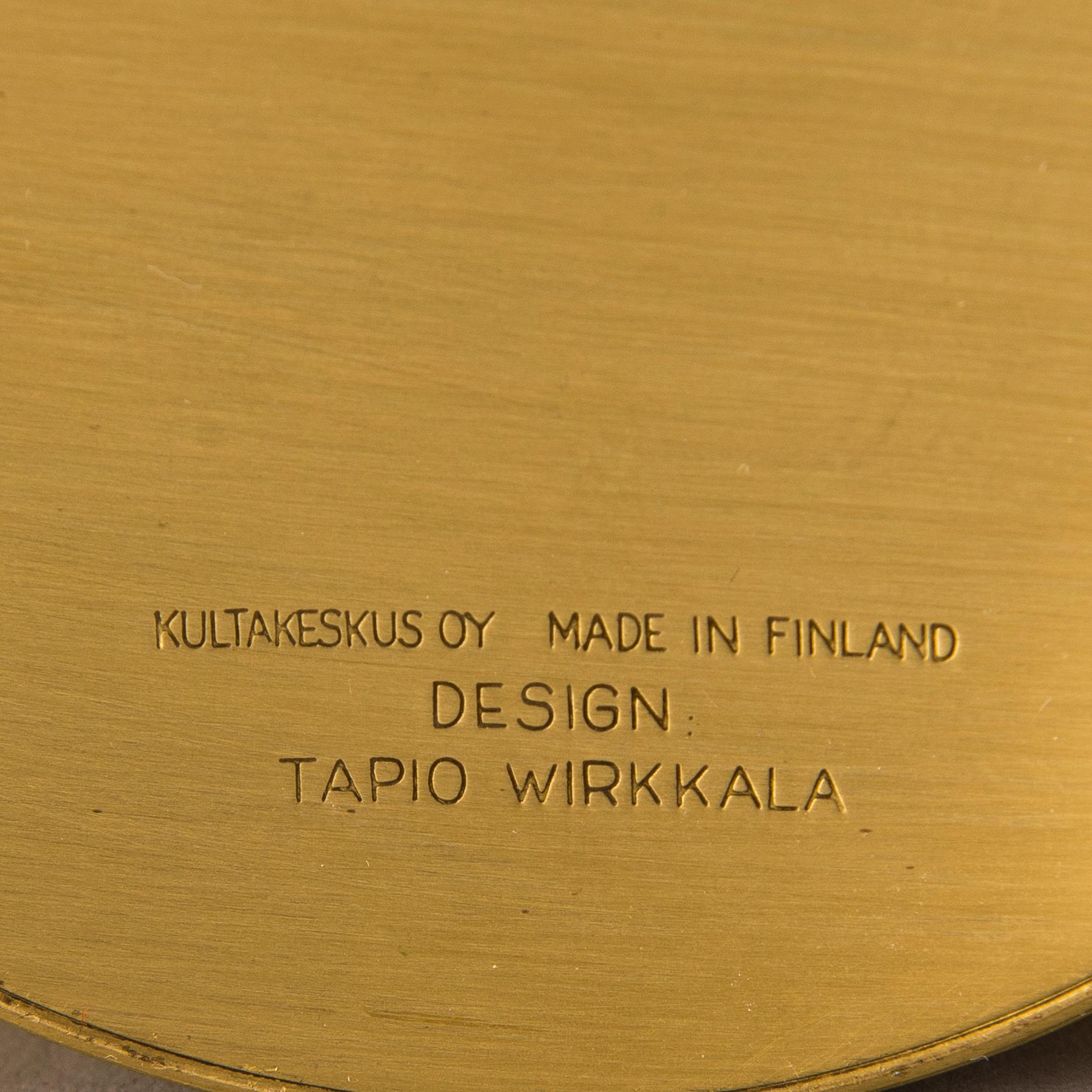 TAPIO WIRKKALA, A set of three brass candleholders, all marked Kultakeskus Oy Made in Finland, Design Tapio Wirkkala.