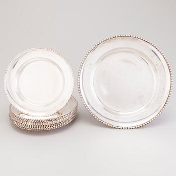 A tray and a set of 12 dishes in silver, mark of C.G. Hallberg, Stockholm 1928.