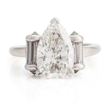 503. A Mauboussin platinum ring set with a pear-shaped diamond approximately 2.50 cts.