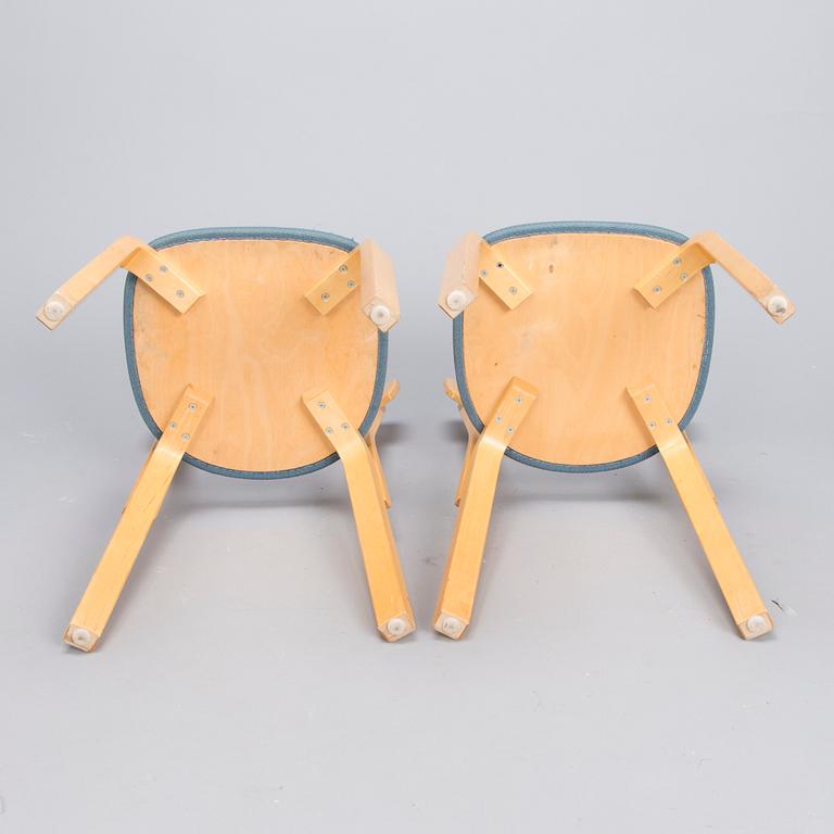 ALVAR AALTO, Two late 20th century  '69' Chairs for Artek,