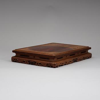 A hardwood stand, Qing dynasty, late 19th century.