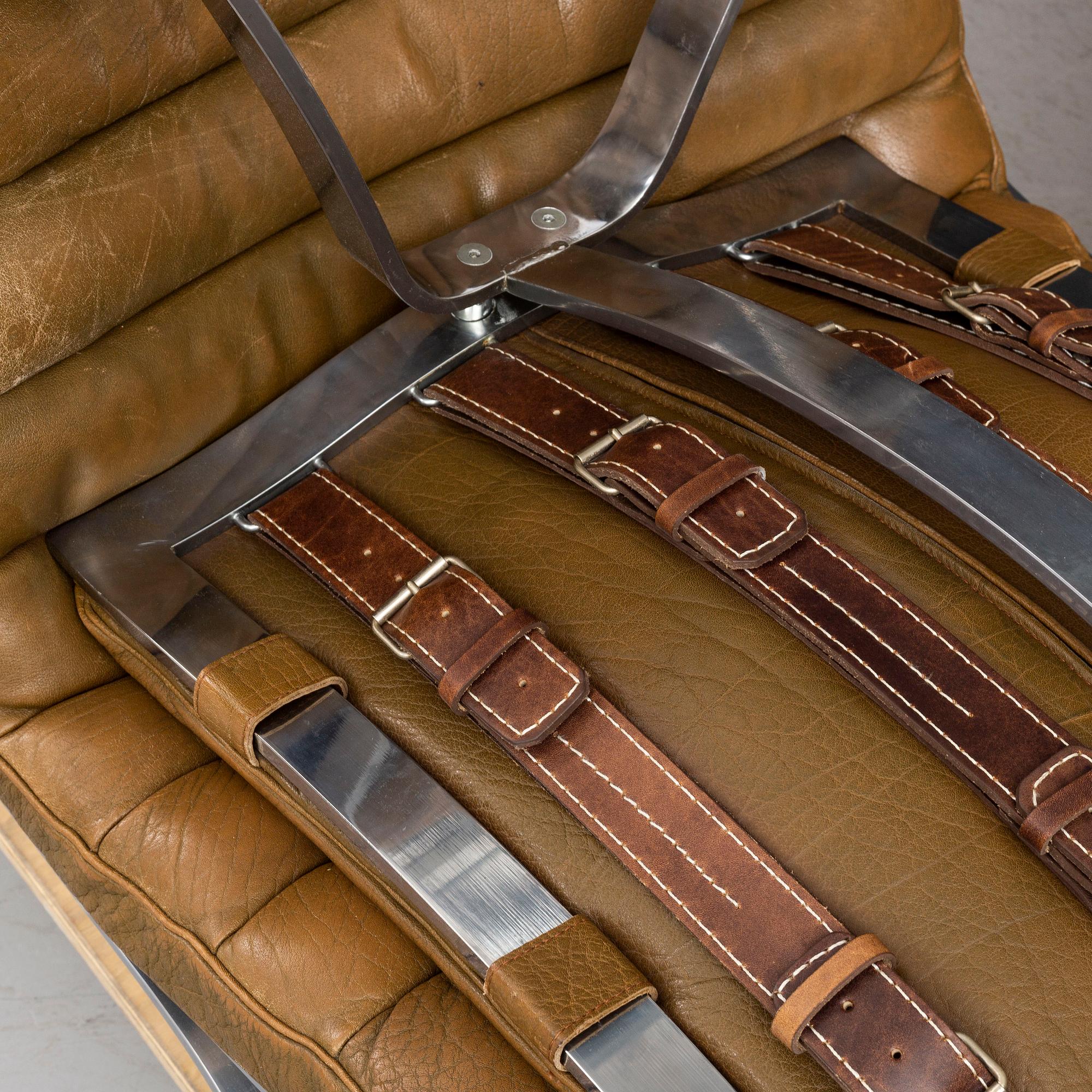 A 'Ari' easy chair and ottoman by Arne Norell.