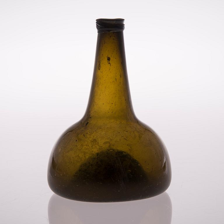 An 18th century glass  bottle.