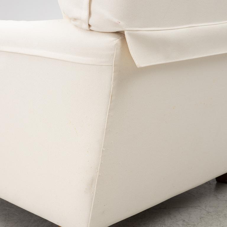 Vico Magistretti, a pair of 'Raffles' armchairs, De Padova, Italy, 21st century.