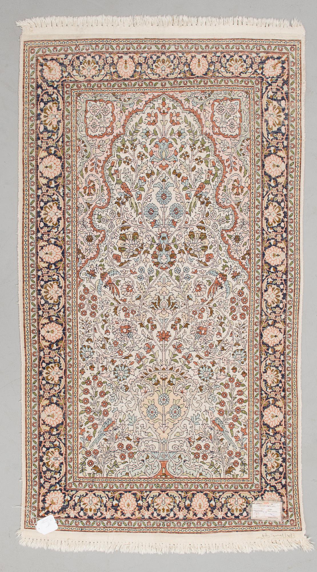 A CARPET, Kashmir, silk on cotton warp, 90x160 cm.
